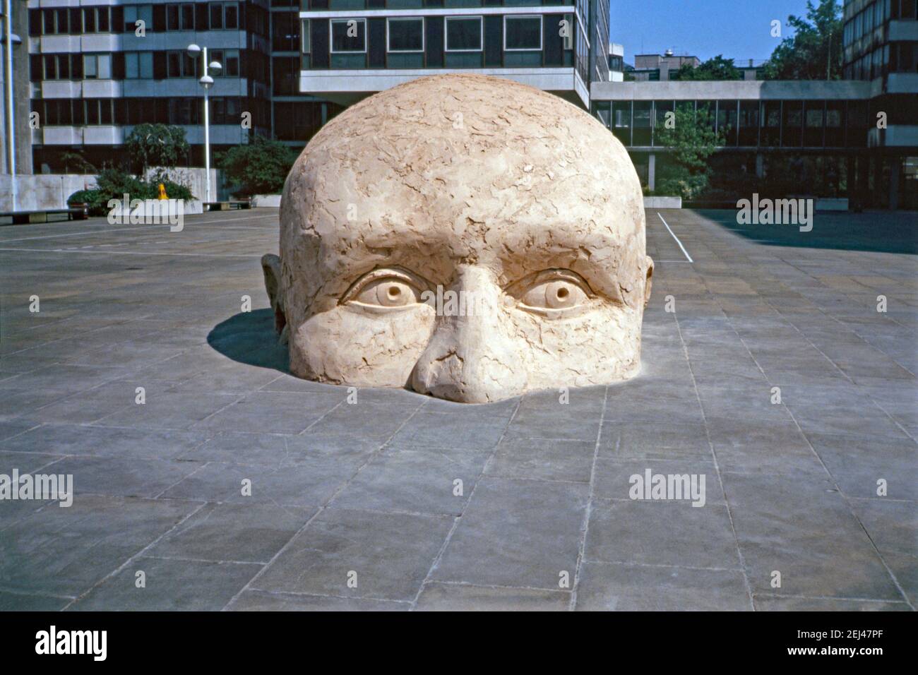 A 1993 sculpture, part of a work called ‘Man’, in Paternoster Square, City of London, England, UK 1993. Collaborating on the sculpture, built onsite were sculptors Alexander Macgregor and Richard Clark. This was part of 1993’s ‘Art in the City’ and was aimed at setting sculpture amongst the green spaces and the distinctive architecture of the City of London. Stock Photo