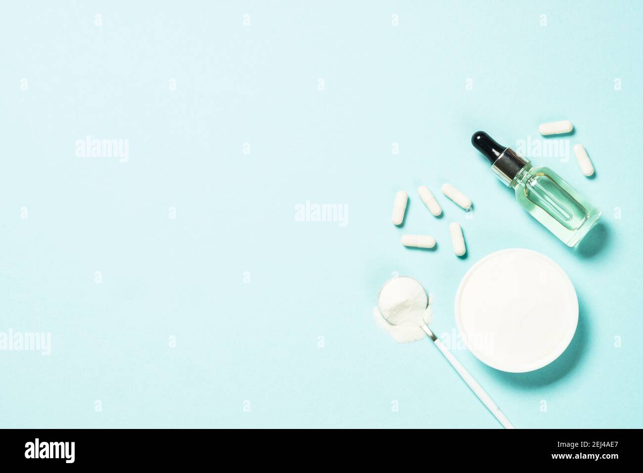 Collagen powder, capsules and serum. Stock Photo