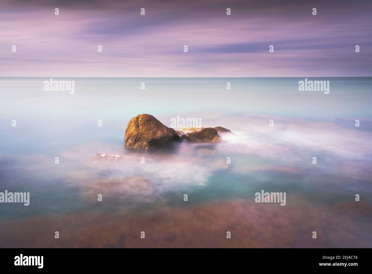 Ocean Rocks Soft Rocks, soft sea and clouds in the sky, beautiful landscape in long ...