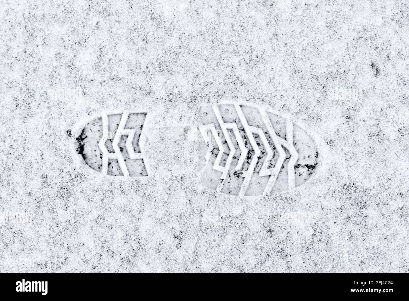 Imptint of boot sole in snow Stock Photo