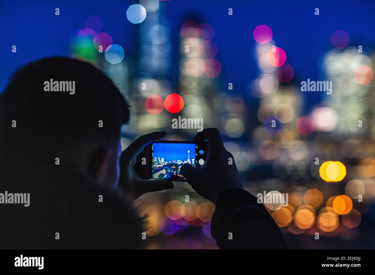 London Bokeh - Blurred Lights City of London Lights at Night - tourists view and take photos of the City of London Financial District at night. Stock Photo