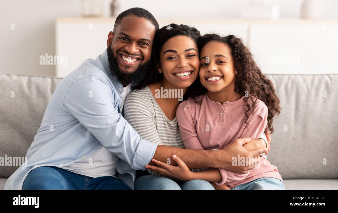 Portrait of a happy black family smiling at home Stock Photo - Alamy