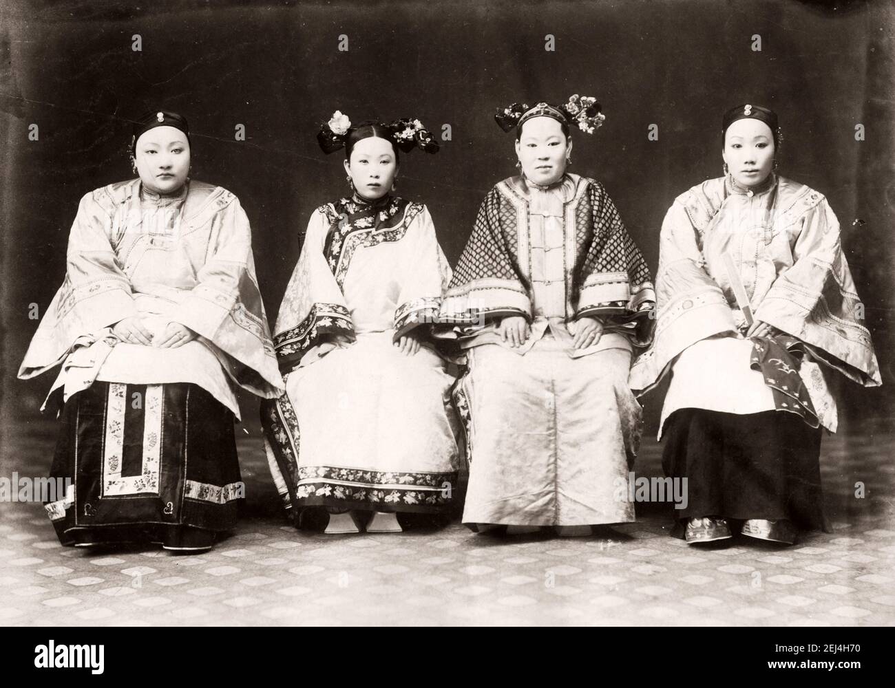 Four Chinese women in ornate robes, China, c.1890's Stock Photo - Alamy