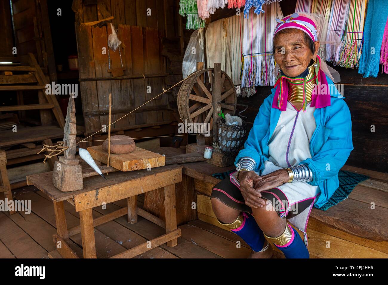 Portrait of a Padaung, giraffe with a traditional weaving chair, woman, Loikaw area, Kayah state, Myanmar Stock Photo