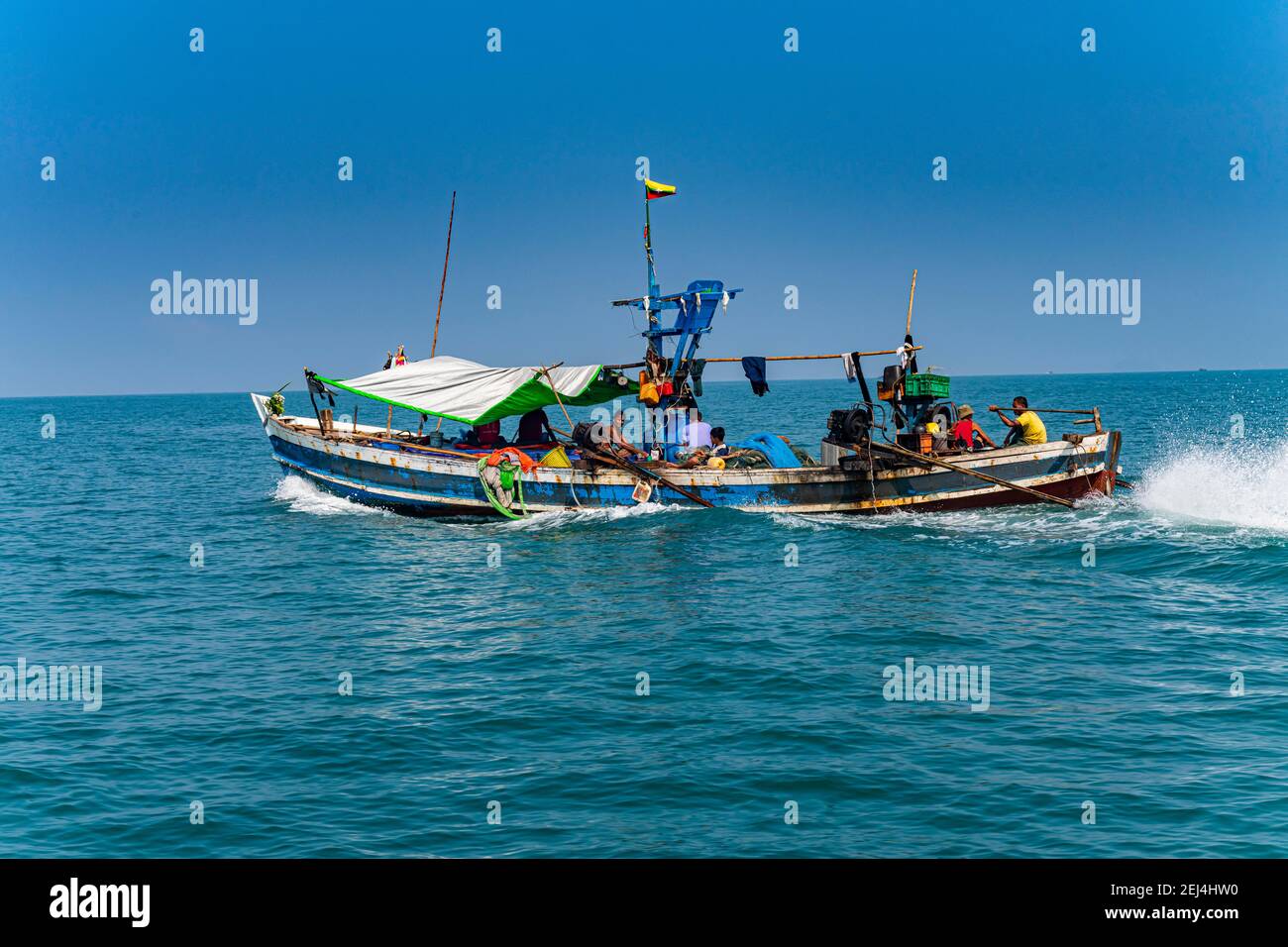 Sea gypsies Moken on their fishing boat, Mergui or Myeik Archipelago, Myanmar Stock Photo