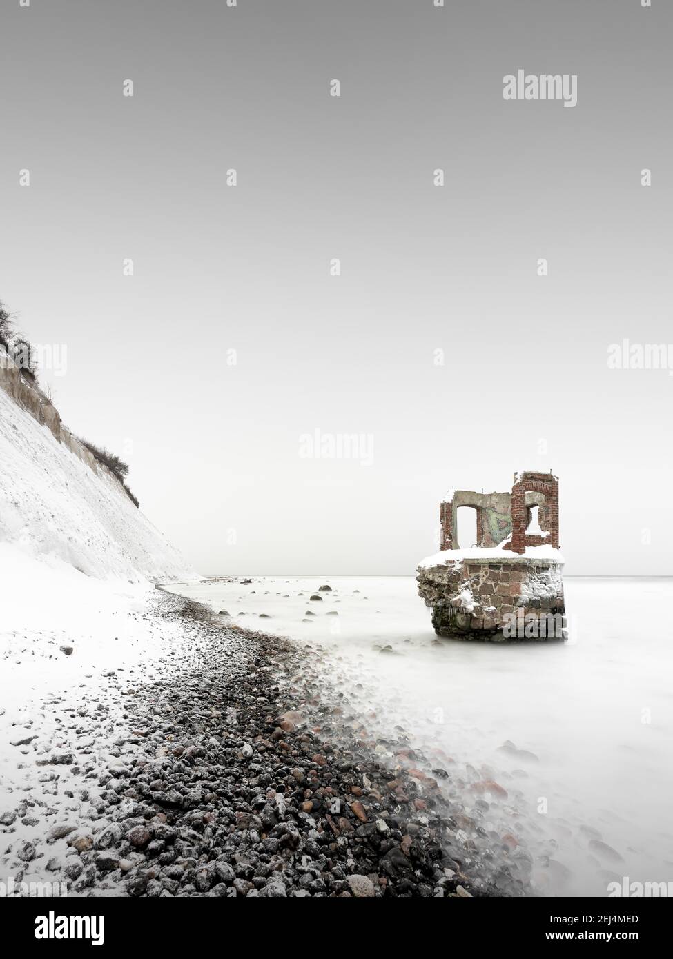 Old tide gauge house on the beach near Kap Arkona on the German island of Ruegen, Mecklenburg