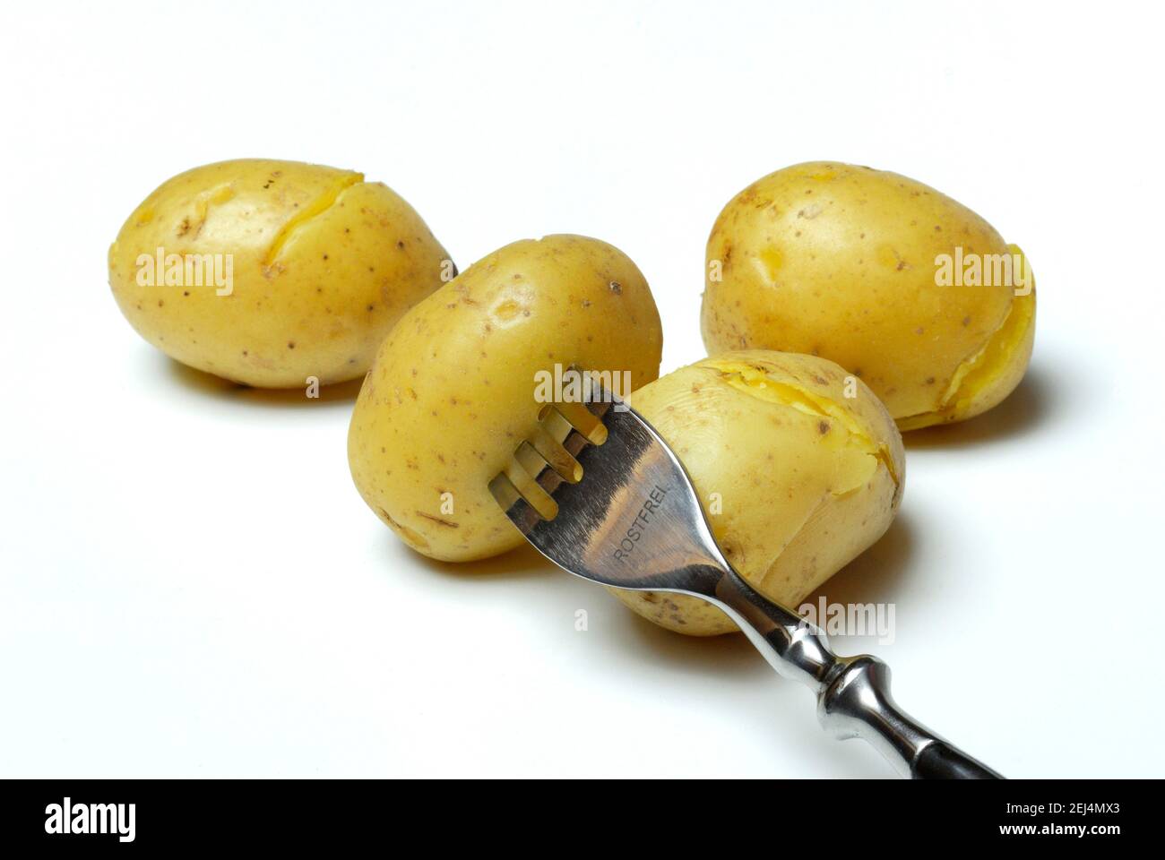 Jacket potato with fork, potatoes, boiled, cooked Stock Photo Alamy