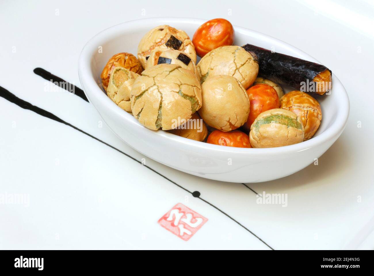 Japanese rice crackers, Nori Gonomi crackers, peanut-rice crackers with seaweed, snacks Stock Photo
