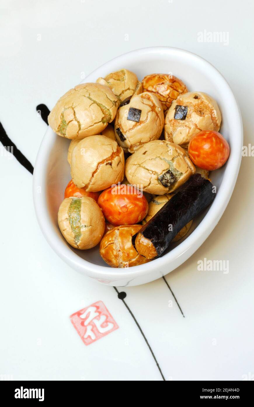 Japanese rice crackers, Nori Gonomi crackers, peanut-rice crackers with seaweed, snacks Stock Photo