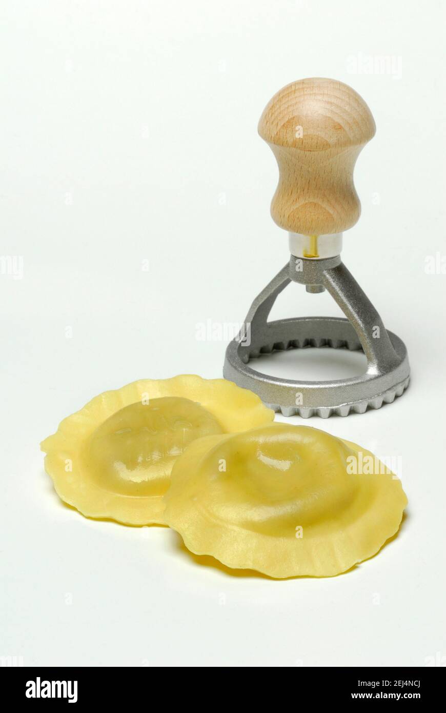 Fresh ravioli with ravioli cutter, pasta, cookie cutter Stock Photo - Alamy