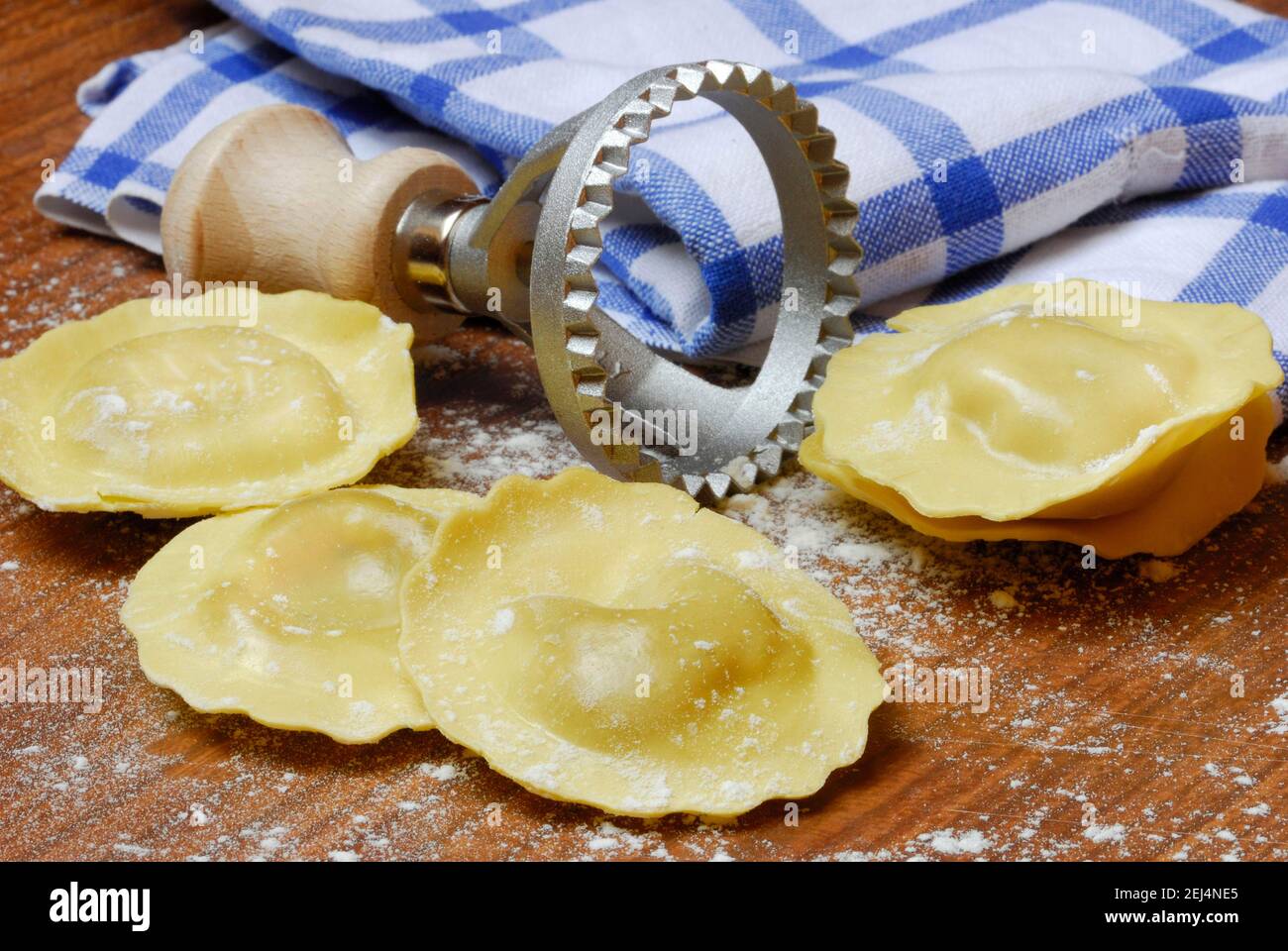Fresh ravioli with ravioli cutter, pasta, cookie cutter Stock Photo