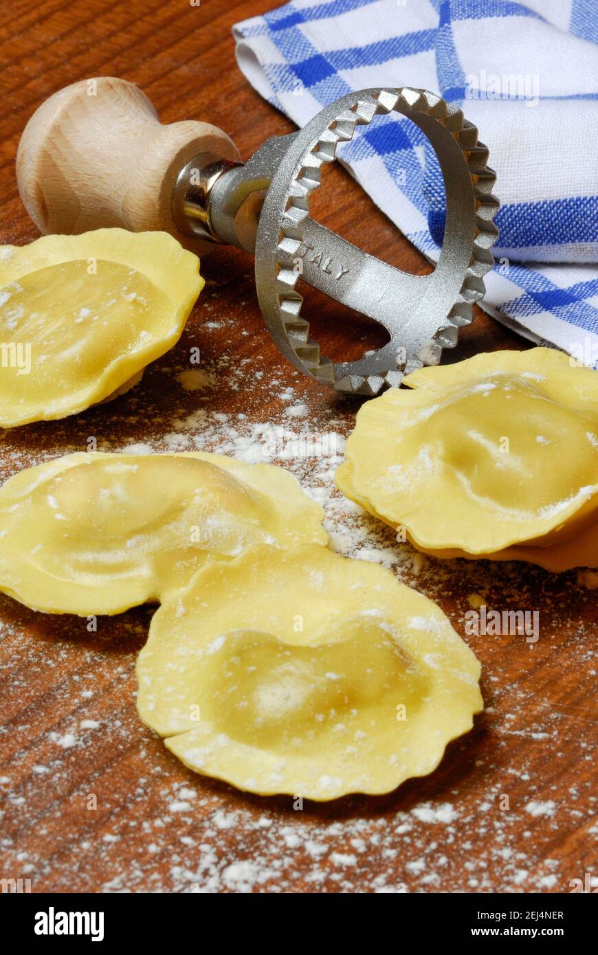 Fresh ravioli with ravioli cutter, pasta, cookie cutter Stock Photo