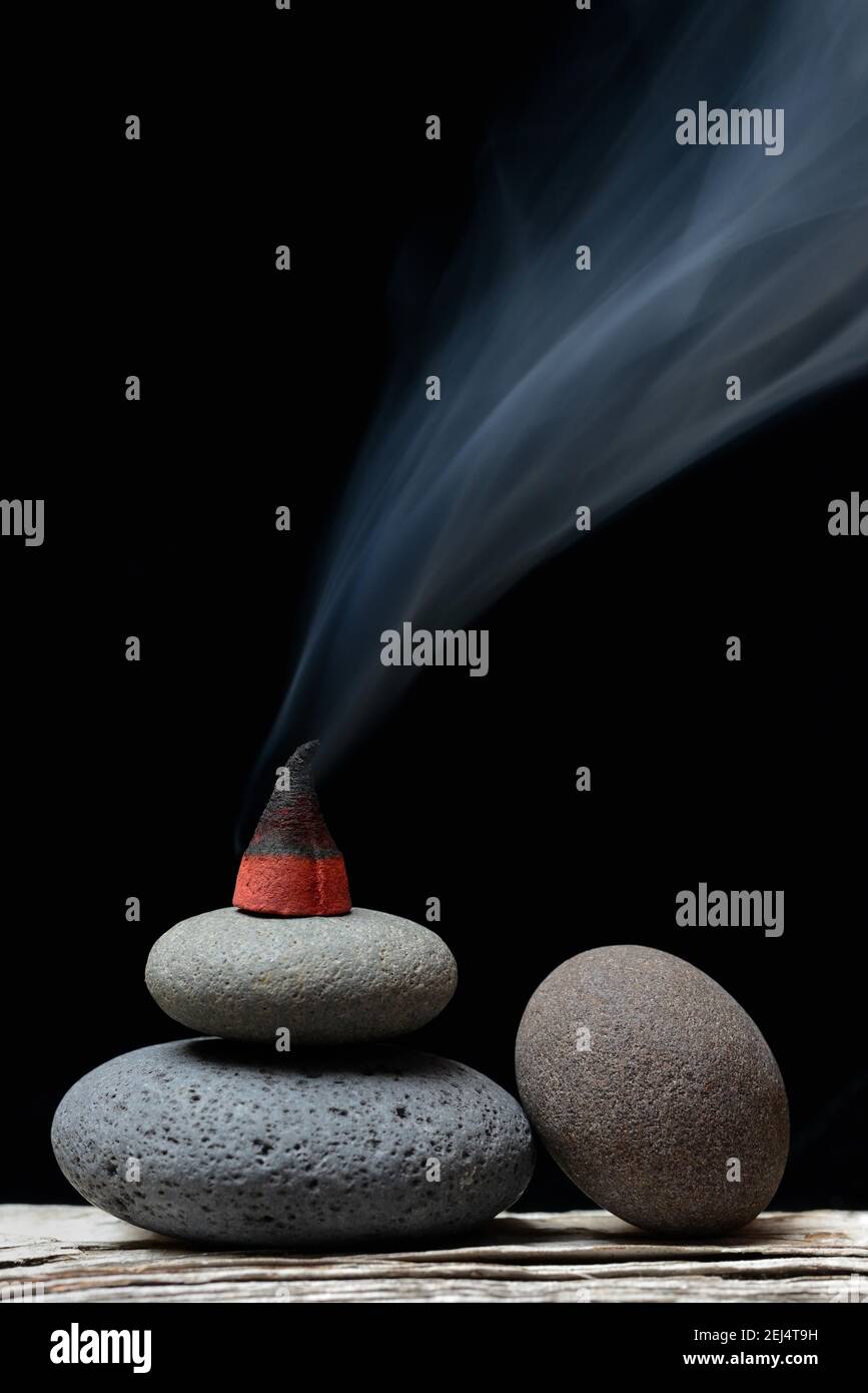 Burning incense cone hi-res stock photography and images - Alamy