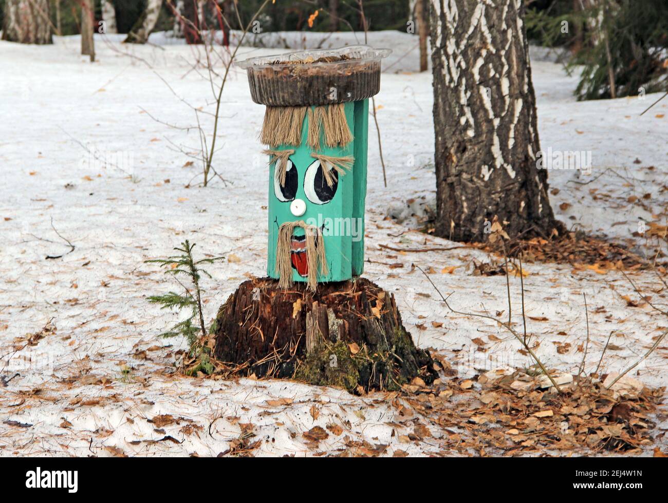 Funny face made of timber, with eyebrows and a mustache Stock Photo - Alamy