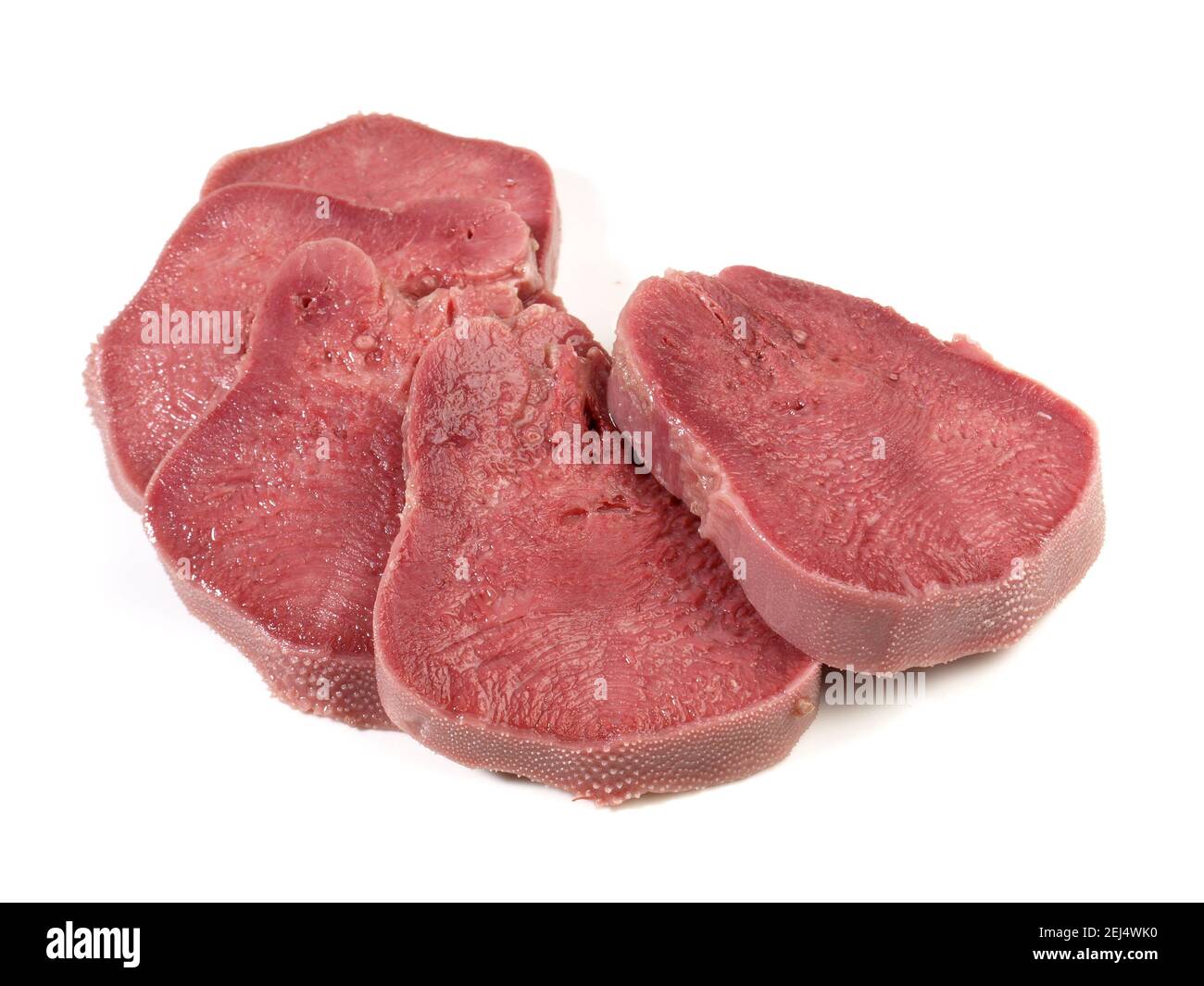 Boiled Cured Veal Tongue Meat Slices isolated on white Background Stock Photo