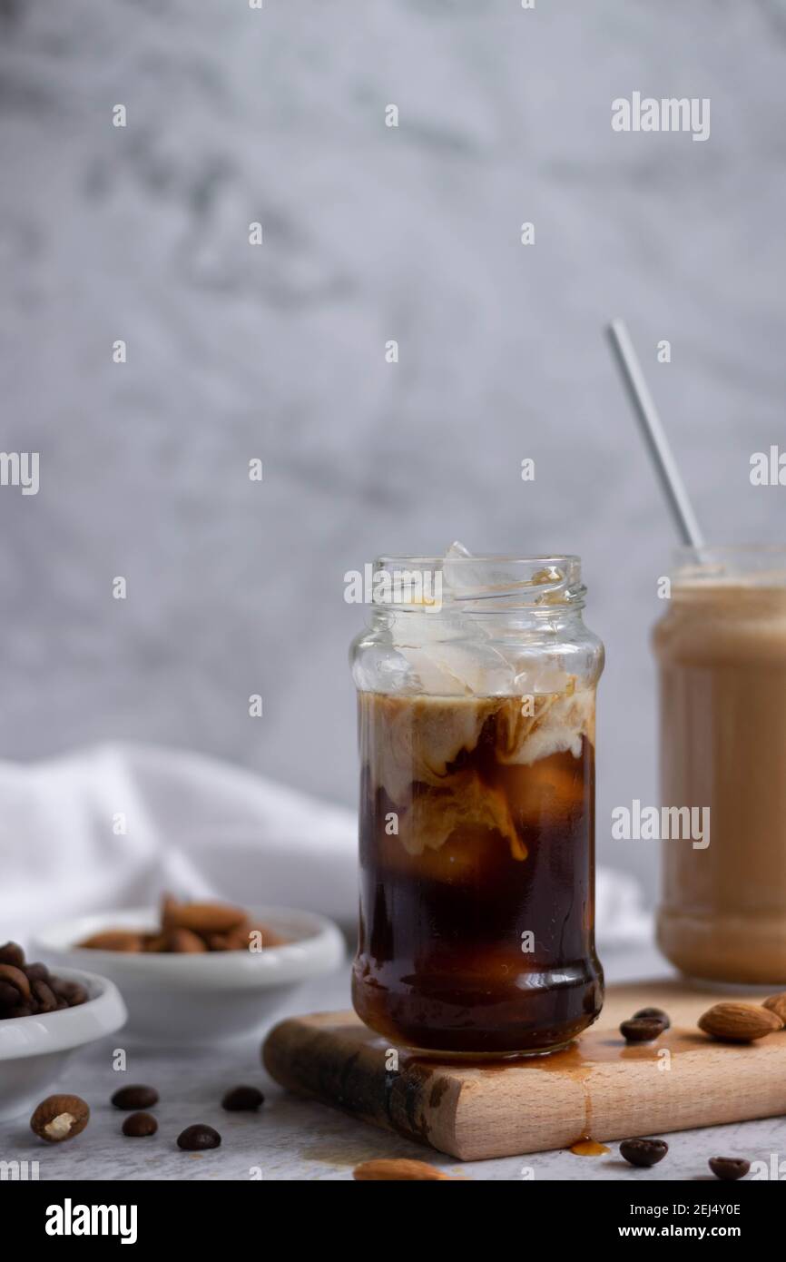 Almond milk iced coffee, refreshing energizing drink Stock Photo