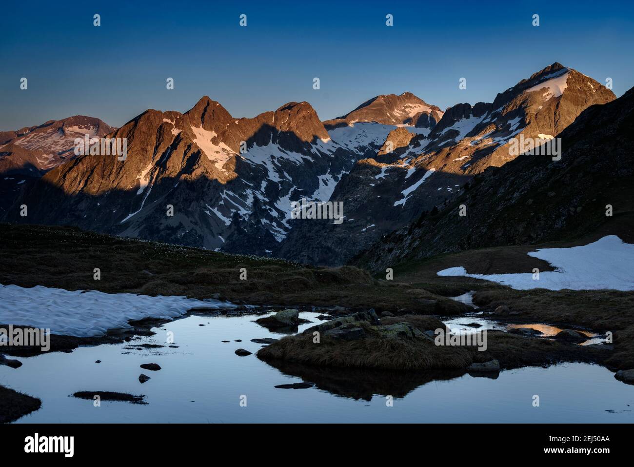 Summer sunrise seen from the path to the port of Benasque. (Benasque Valley, Aragon, Pyrenees, Spain) Stock Photo