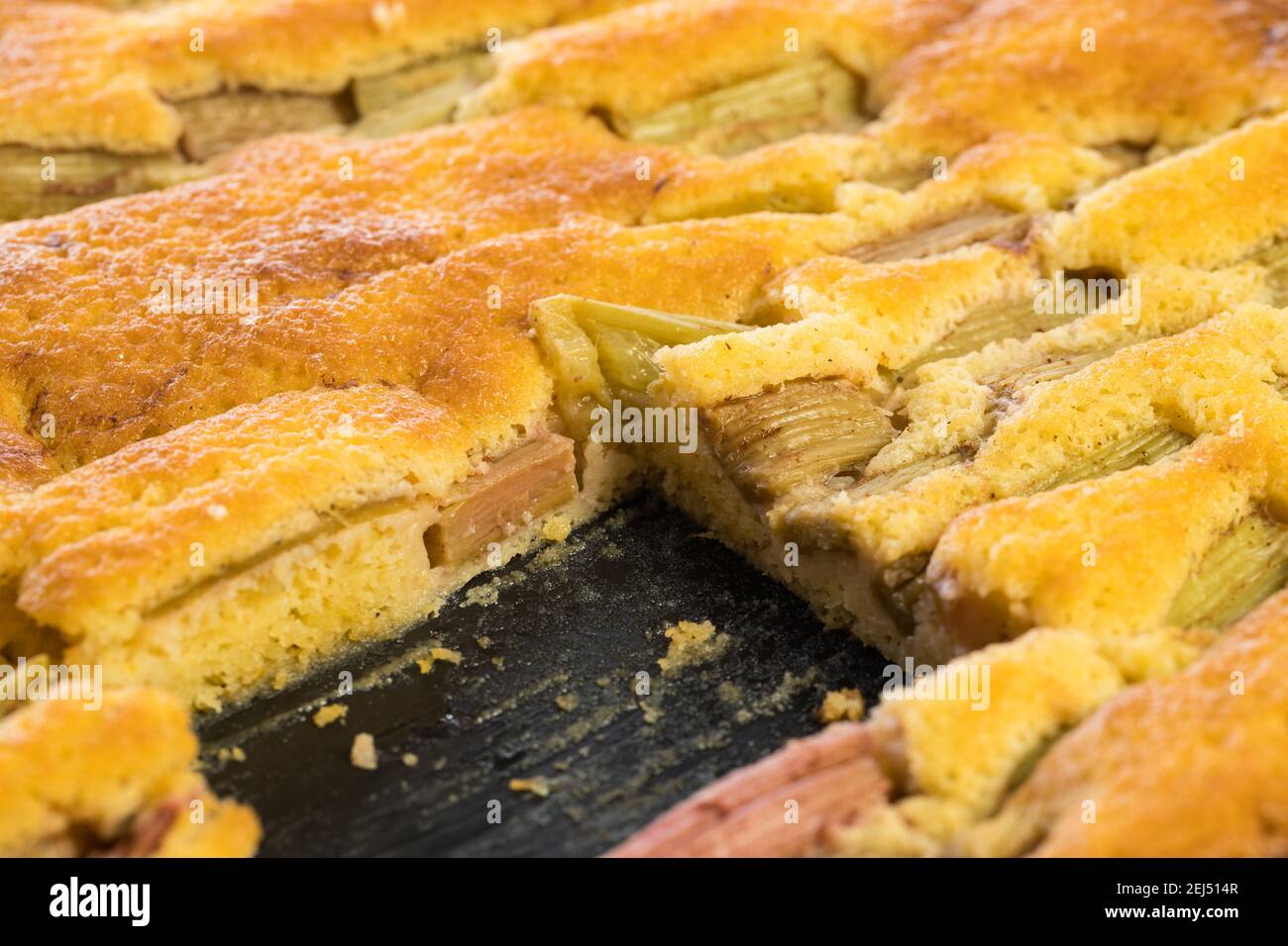 rhubarb cake with one piece missing Stock Photo