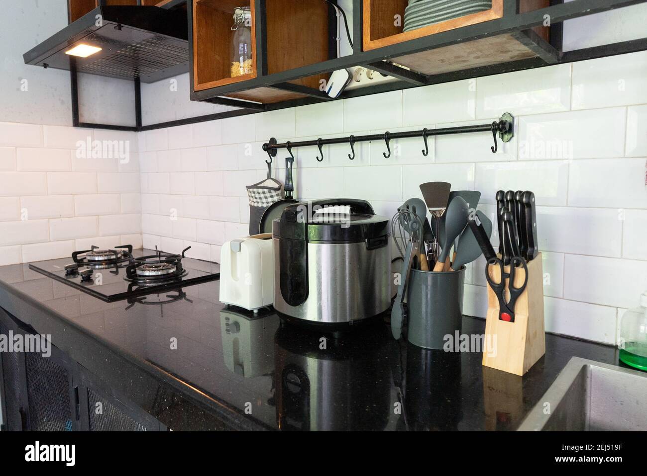 Modern kitchen interior with stove and sink Stock Photo Alamy