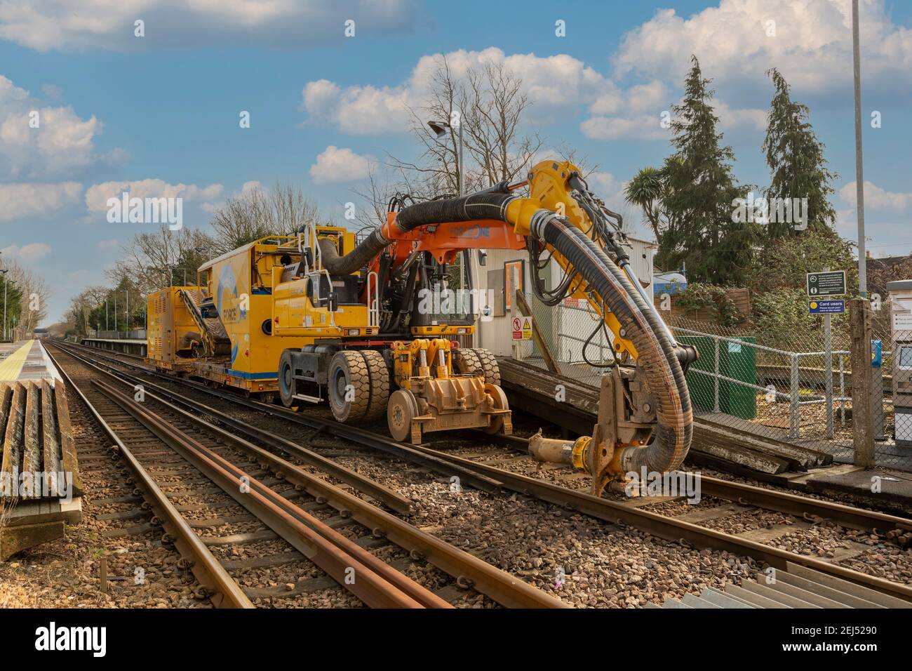 Gigantic Vacuum cleaner at Warblington Station near Havant. Force One suction excavator working on tracks. Stock Photo