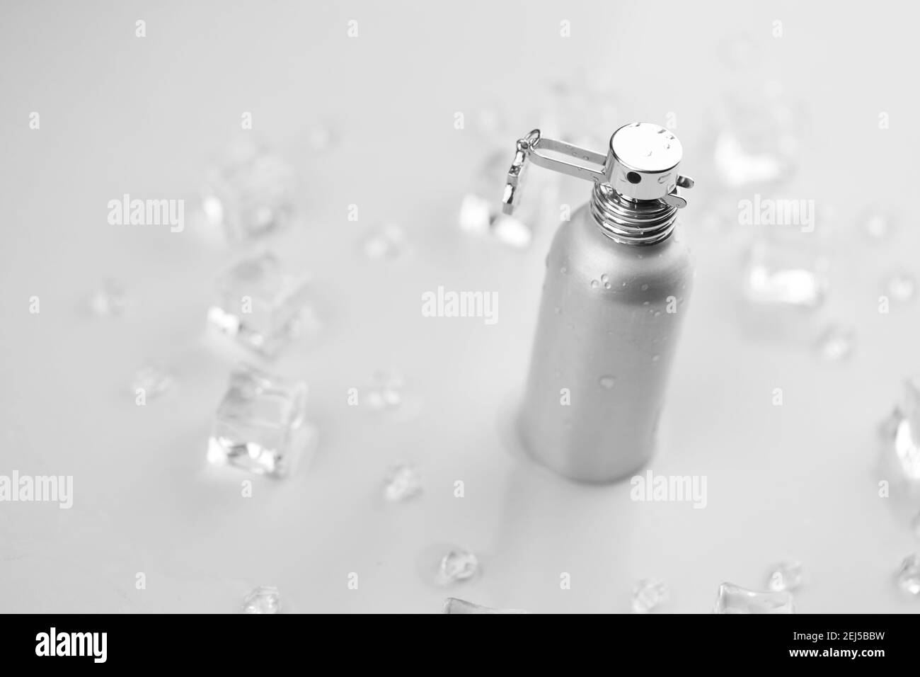 Female perfume silvery bottle, Objective photograph of metallic perfume ...