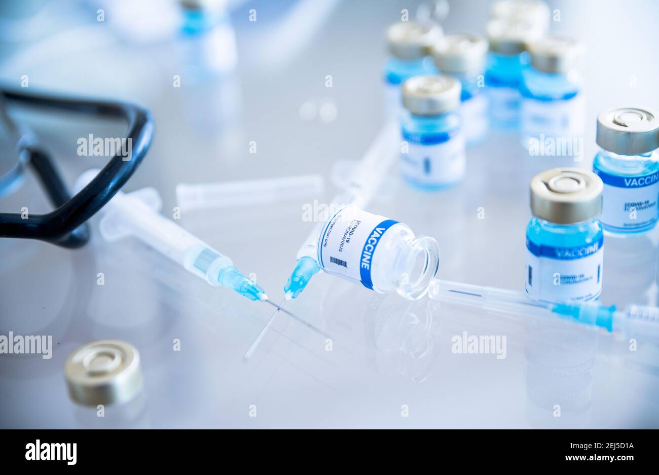 Vials, ampouels with coronavirus vaccine and syringe Stock Photo Alamy