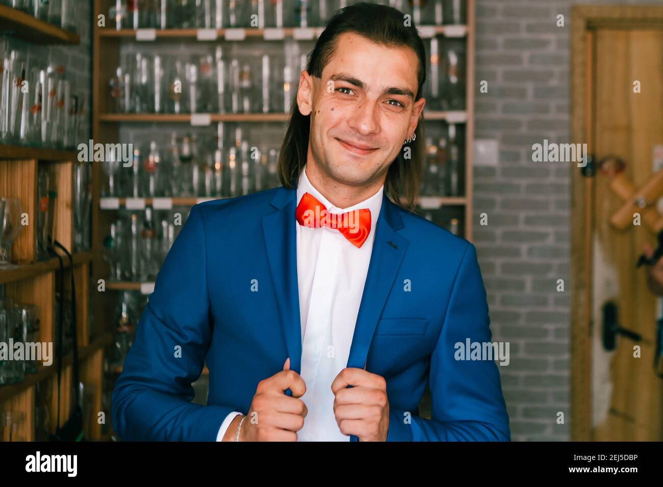 Formal white shirt and blue suit clothing red bow tie hi-res stock ...