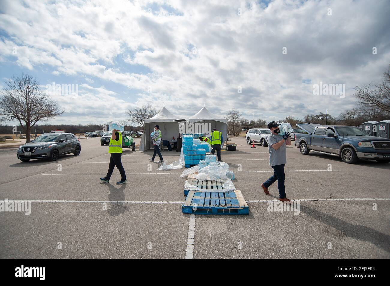 February 21, 2021 Vehicles wait in line at the Onion Creek Soccer