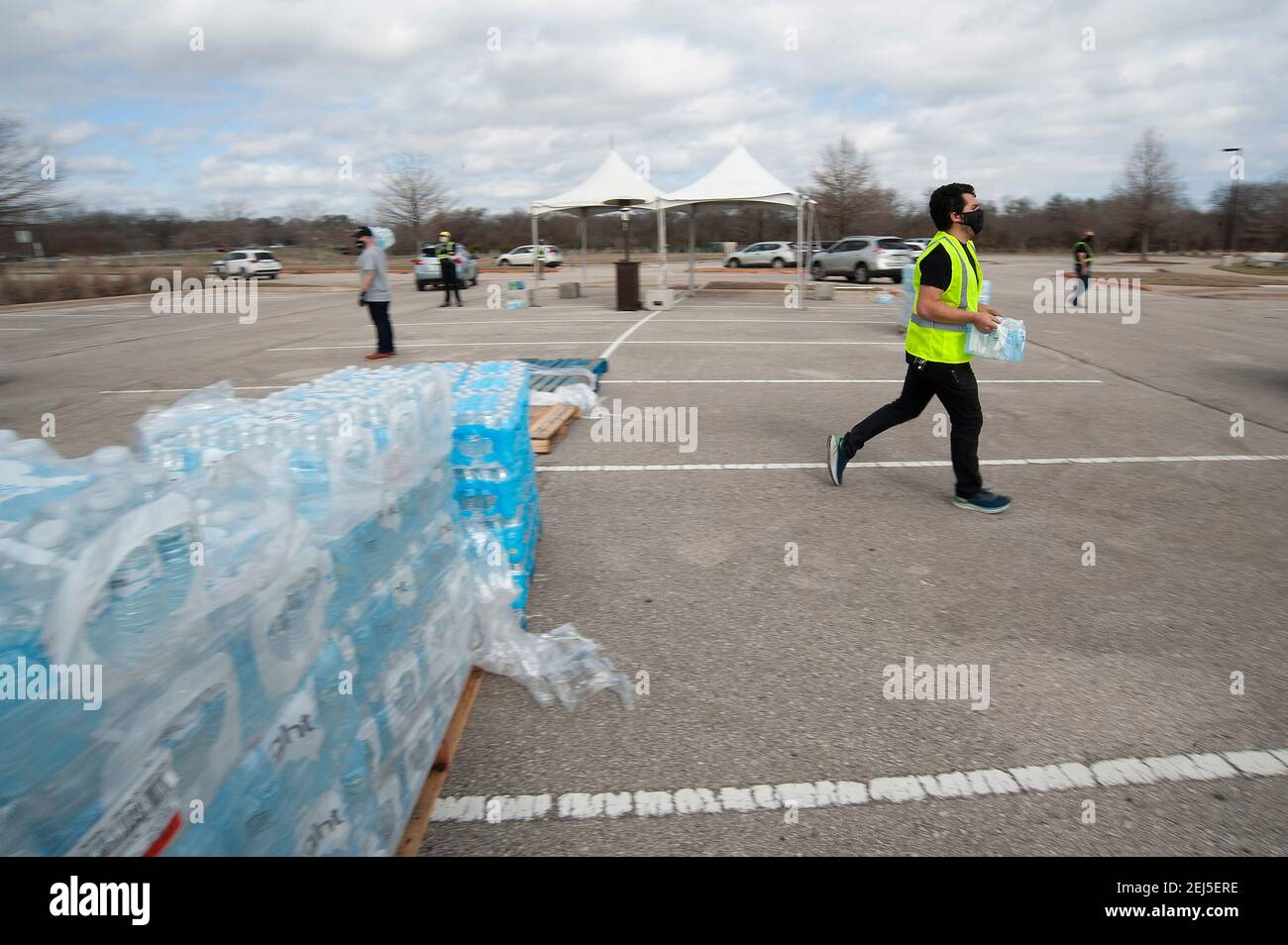 February 21, 2021 Vehicles wait in line at the Onion Creek Soccer