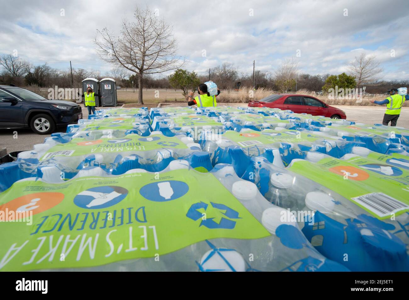 February 21, 2021 Vehicles wait in line at the Onion Creek Soccer
