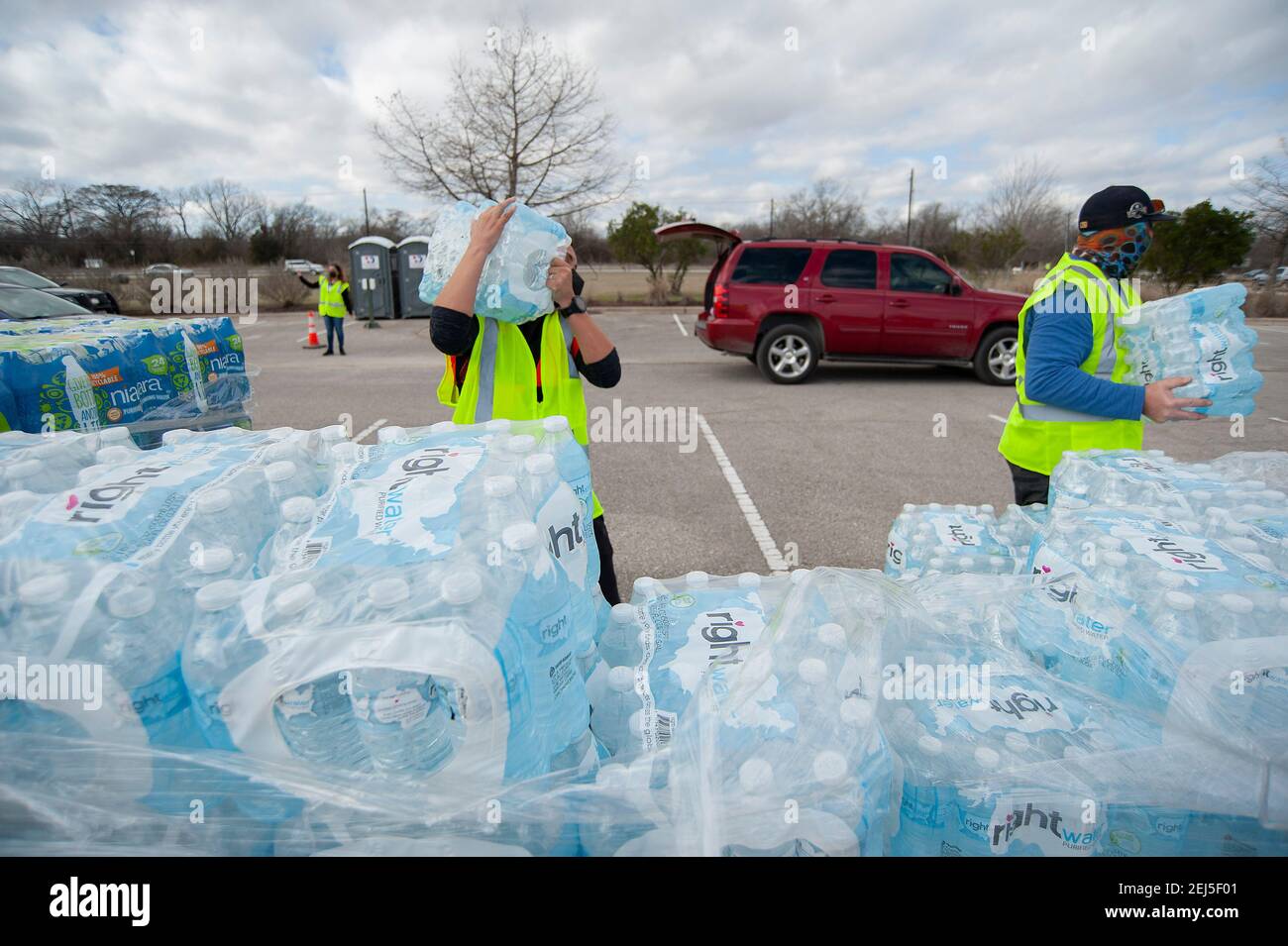 February 21, 2021 Vehicles wait in line at the Onion Creek Soccer