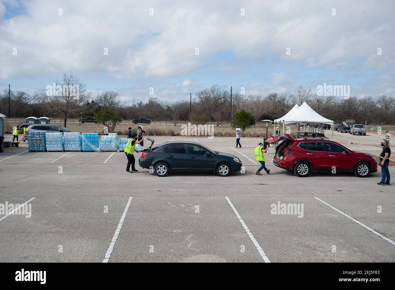 February 21, 2021 Vehicles wait in line at the Onion Creek Soccer