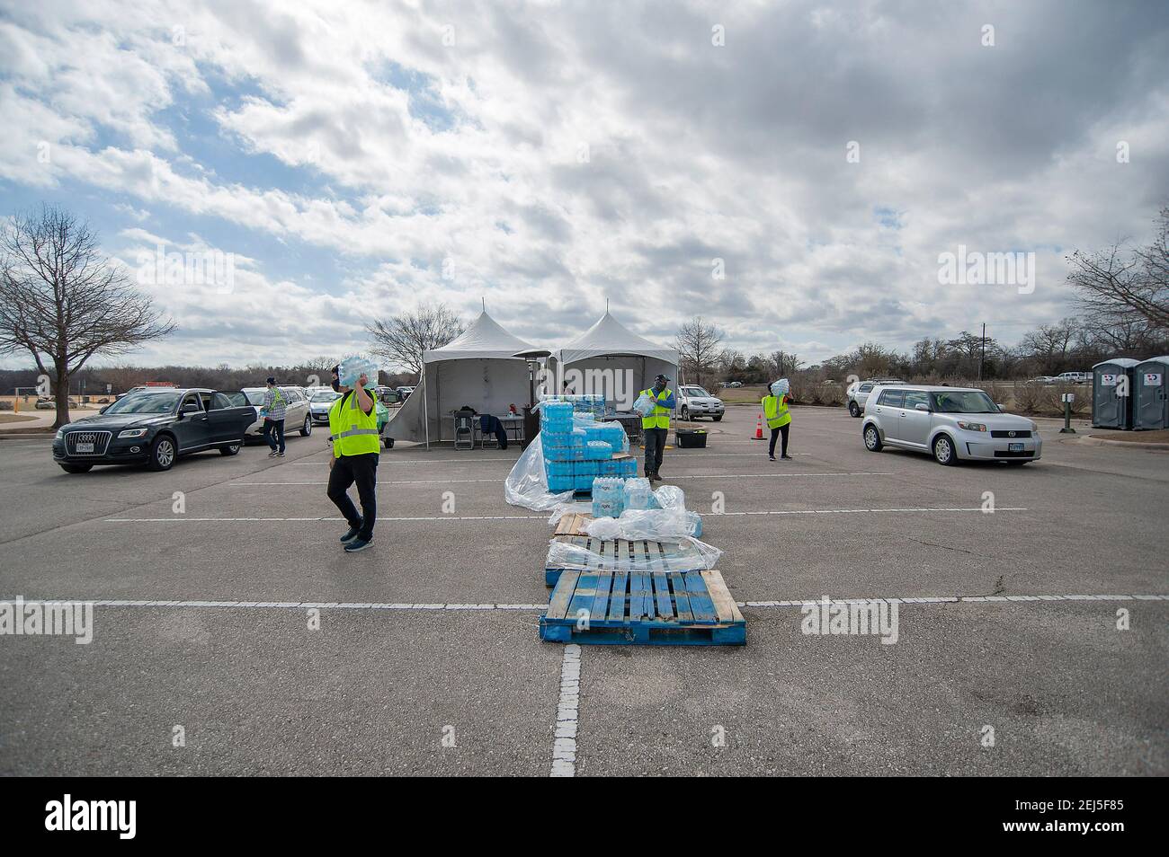 February 21, 2021 Vehicles wait in line at the Onion Creek Soccer