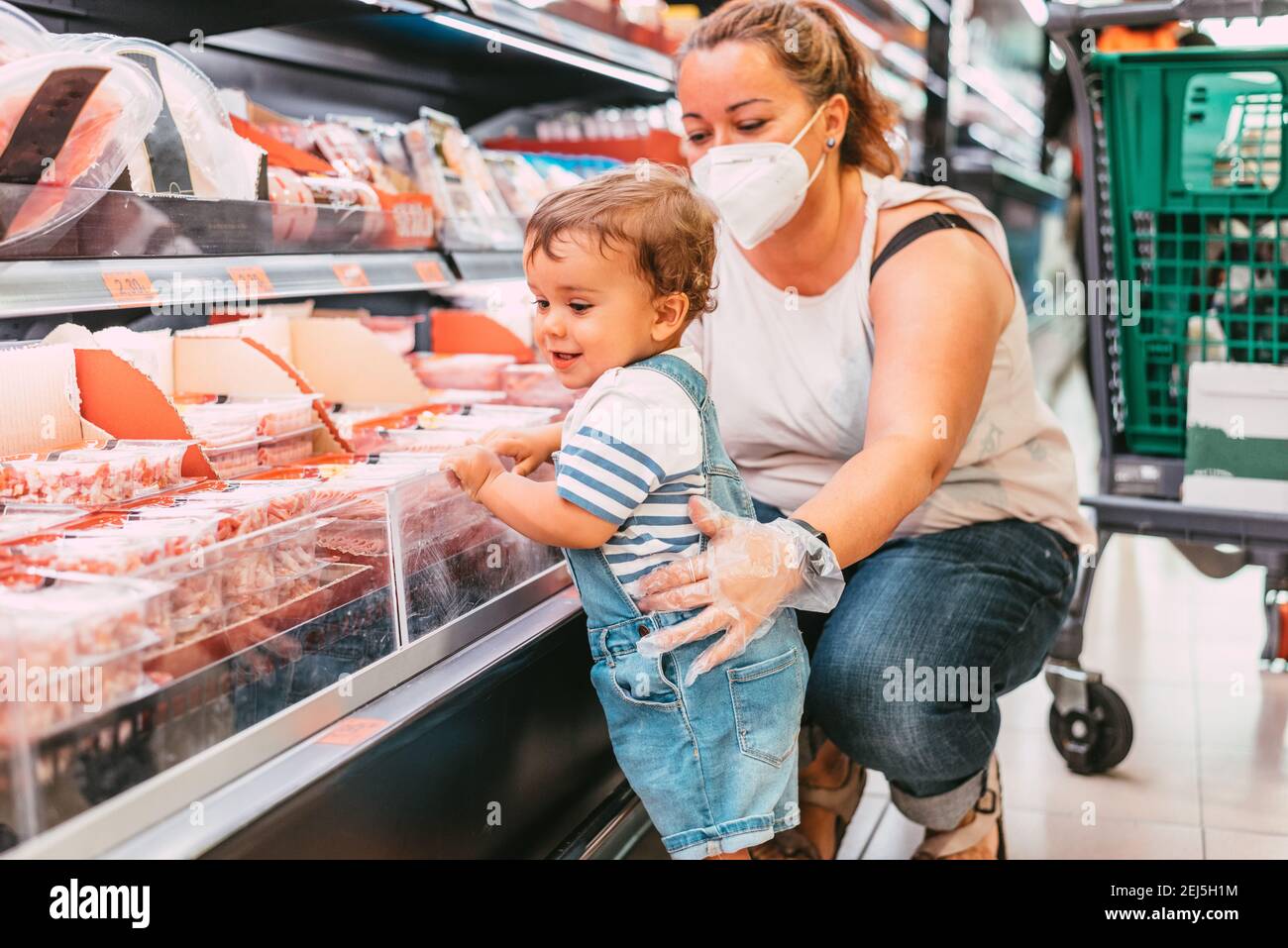 mother and son shopping at the supermarket Stock Photo Alamy