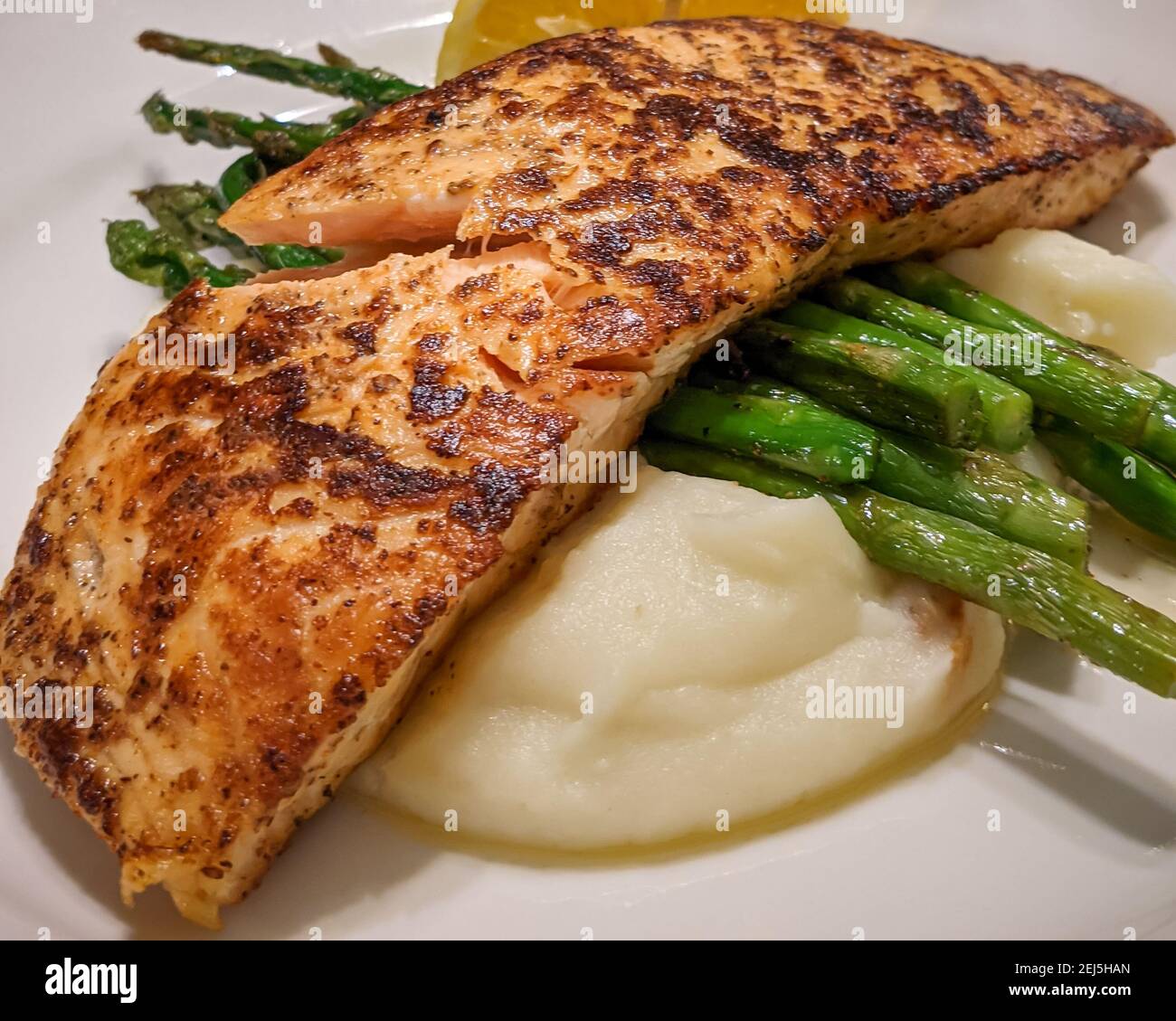 Pan seared salmon fillet dinner at home Stock Photo - Alamy
