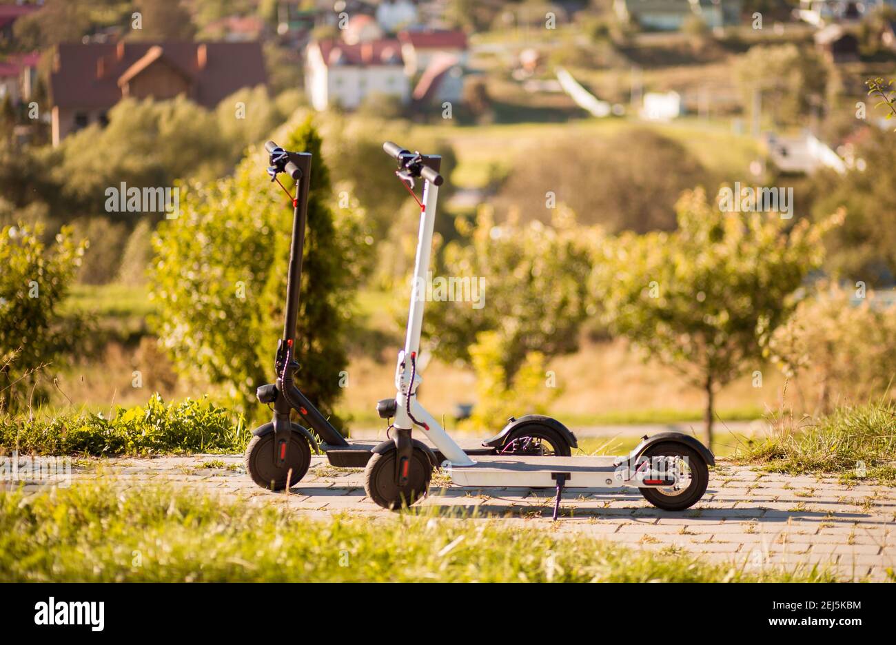 Two new electric scooters in rental park ready to go. Paid rental of