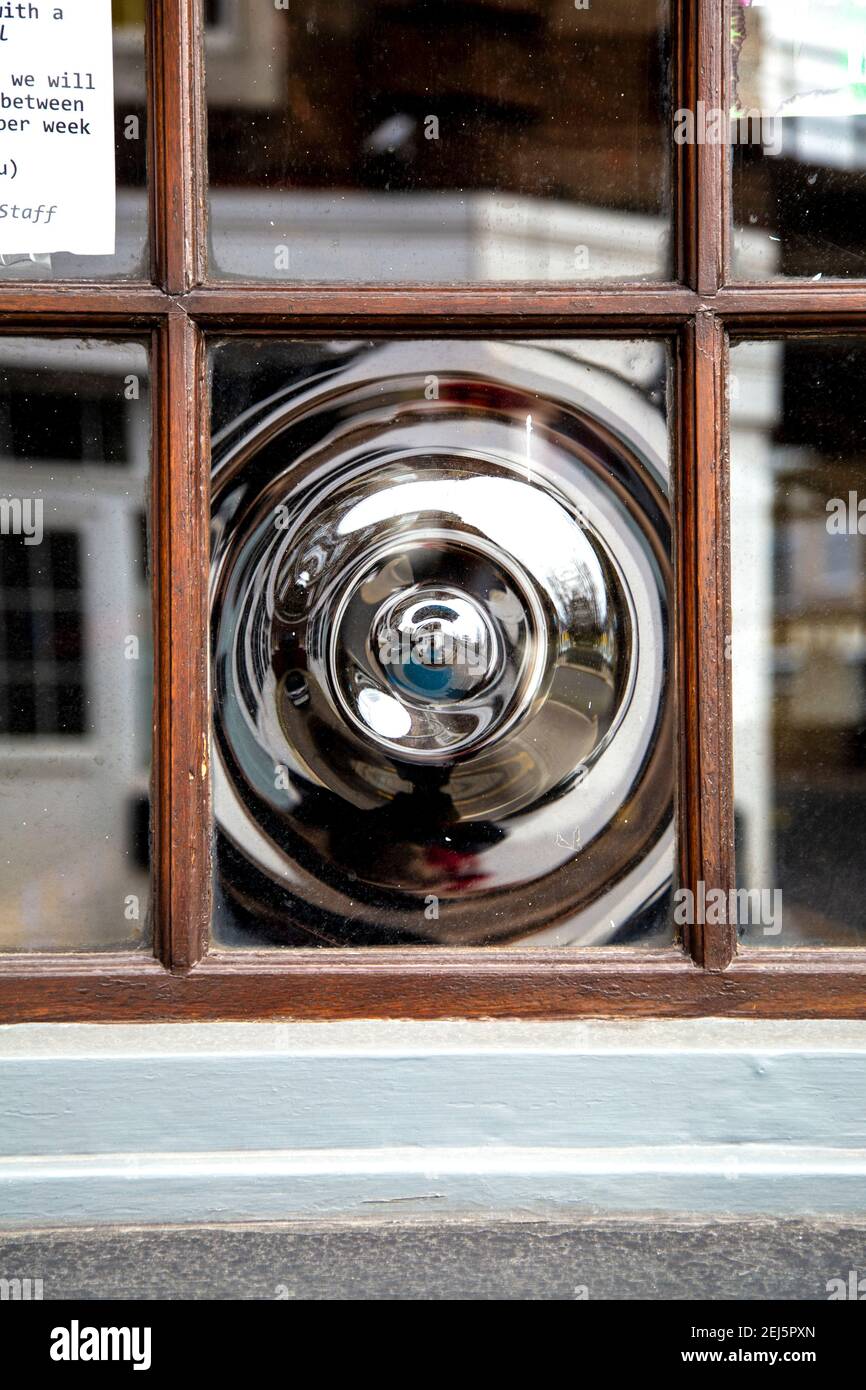 Old-fashioned pub window made with the 'crown glass' technique, London, UK Stock Photo