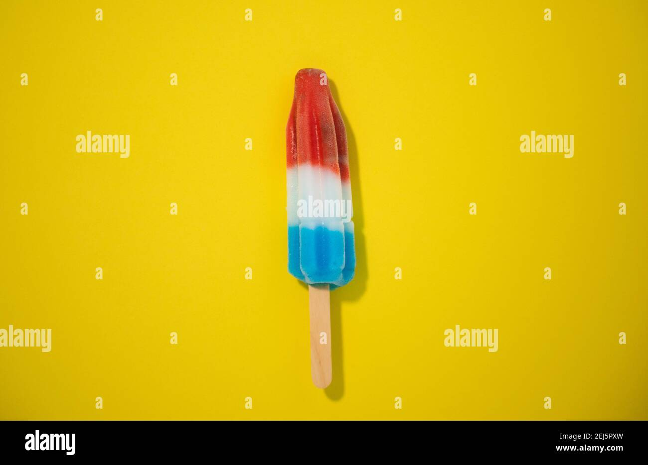 Novelty ice cream treat shot on solid colorful background. Series 1 of 9. Stock Photo