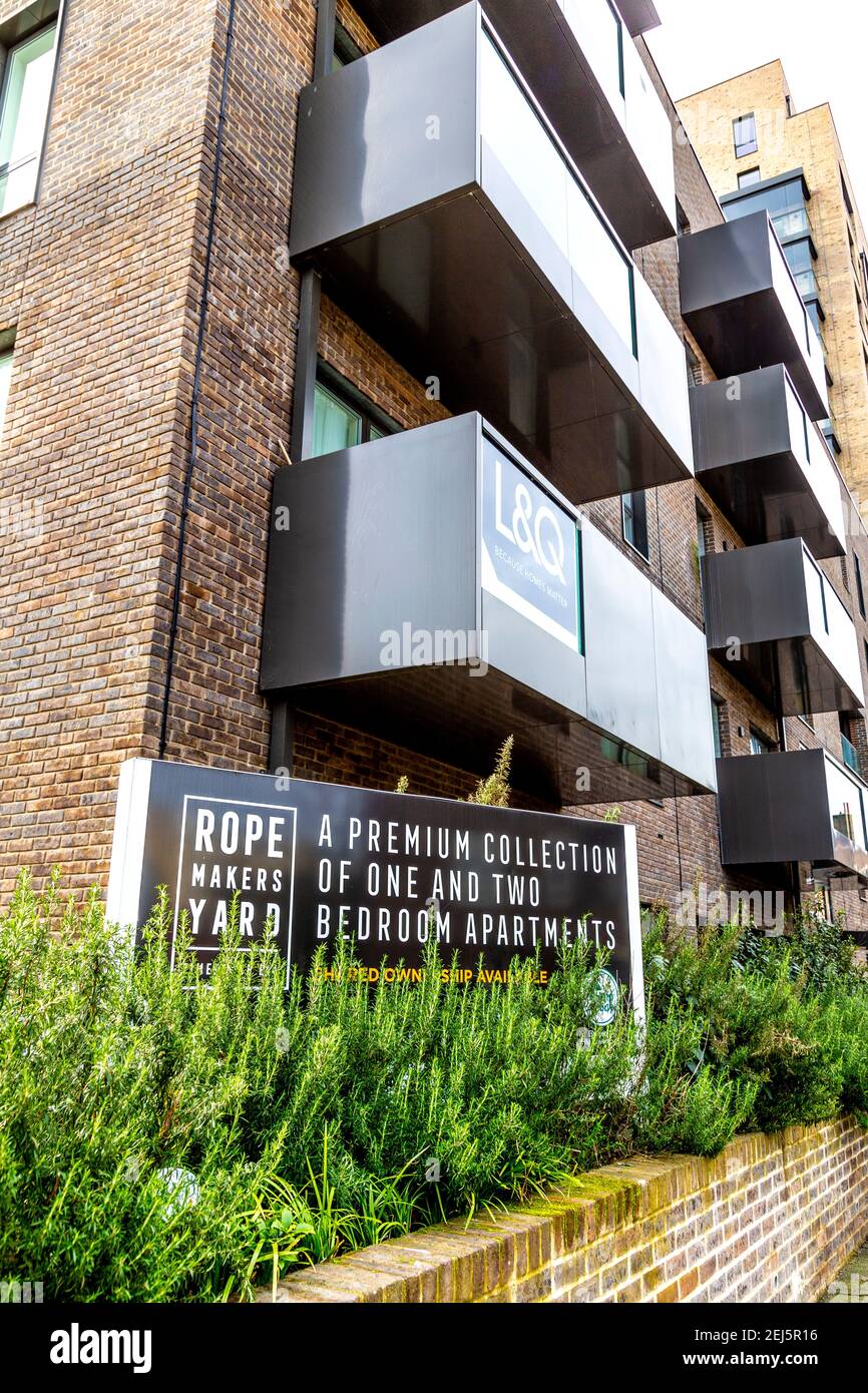 Sign in front of new, residential block Ropemakers Yard with properies available under the Shared Ownership scheme in Limehouse, London, UK Stock Photo