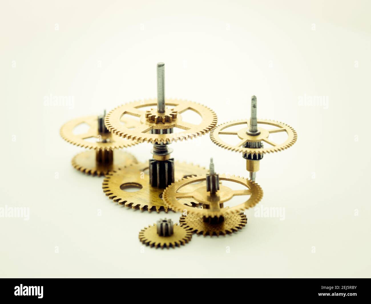 Gears and cogs macro, blue background. Side view. Vintage Stock Photo