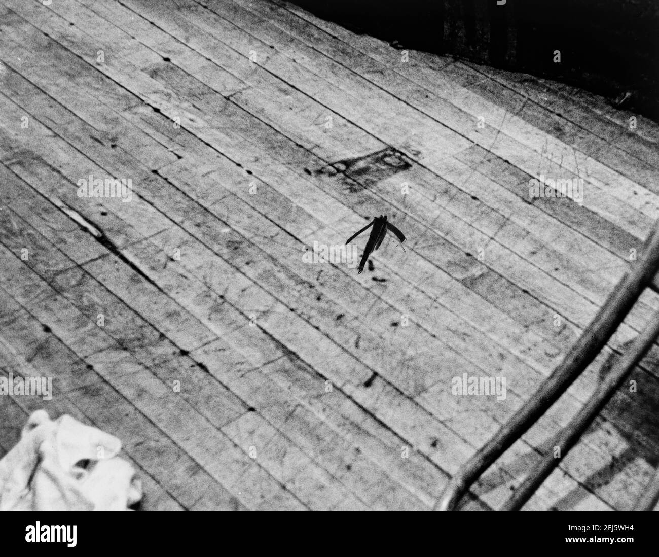 Crude ink arrow shows blood stain on stage of Audubon Ballroom where