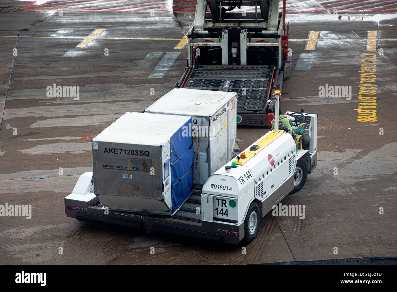 A container transporter for aircraft cargo Unit Load Devices at Singapore International Airport Stock Photo