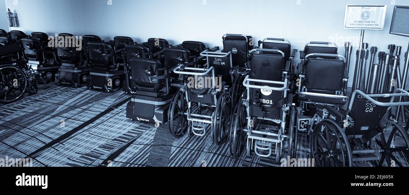 Wheelchair fleet of Singapore International Airport, parked in a