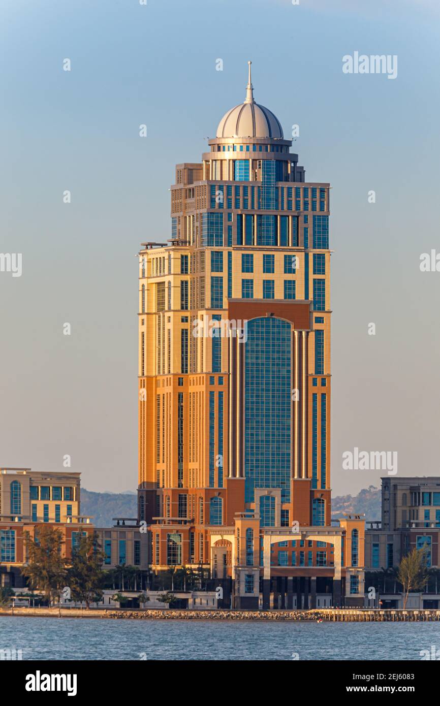 Kota Kinabalu, Sabah, Malaysia: Sabah State Administrative Centre, overlooking Likas Bay. The 33-storey office tower is the tallest building in Borneo Stock Photo