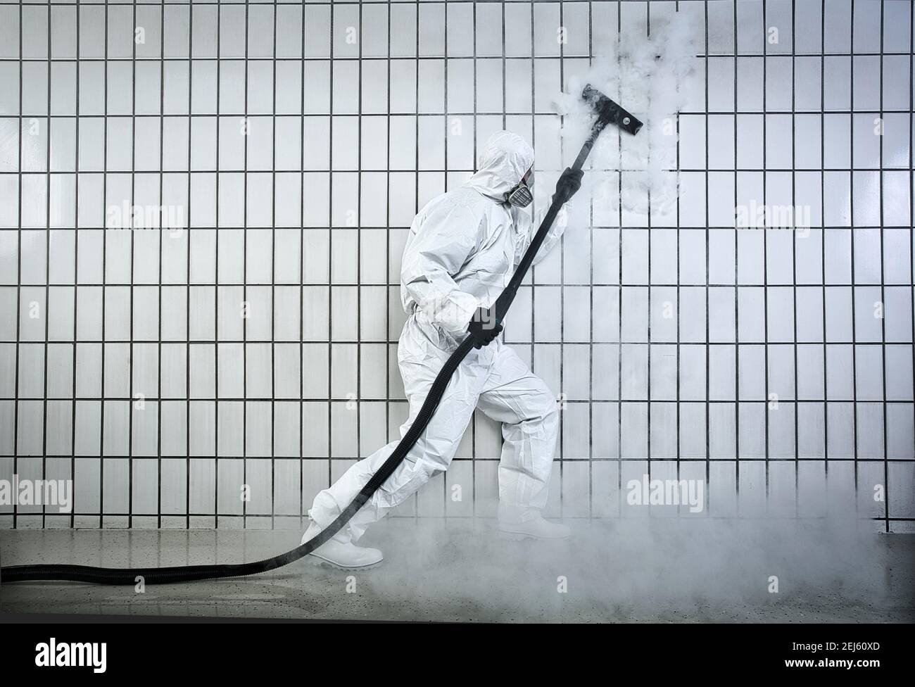 cleaner dry ice cleaning tiles. Stock Photo