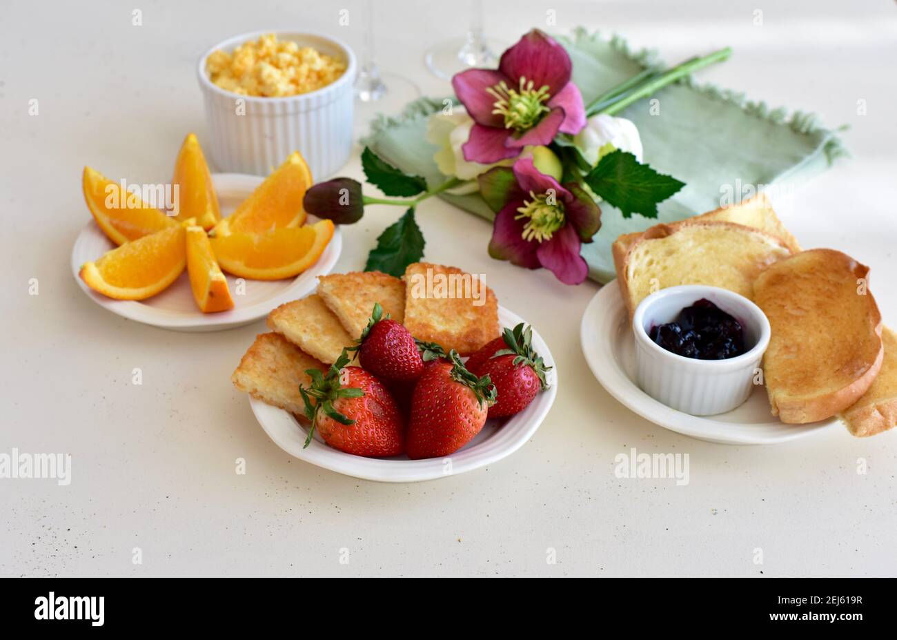 Traditional style American breakfast arranged on tray for hotel room service brunch in bed. Copy space, food photo concept, background Stock Photo