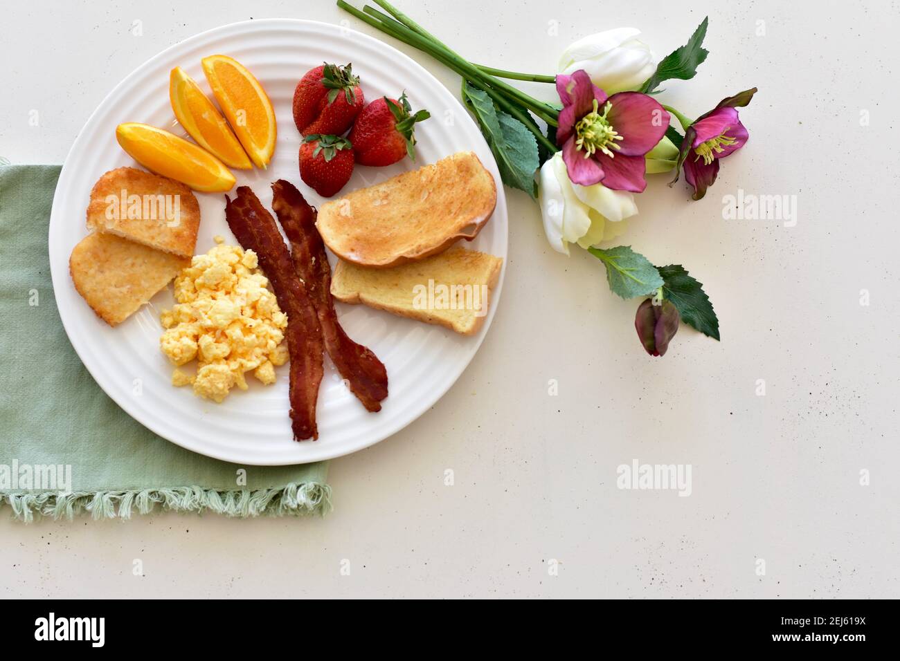 Traditional style American breakfast arranged on tray for hotel room service brunch in bed. Copy space, food photo concept, background Stock Photo