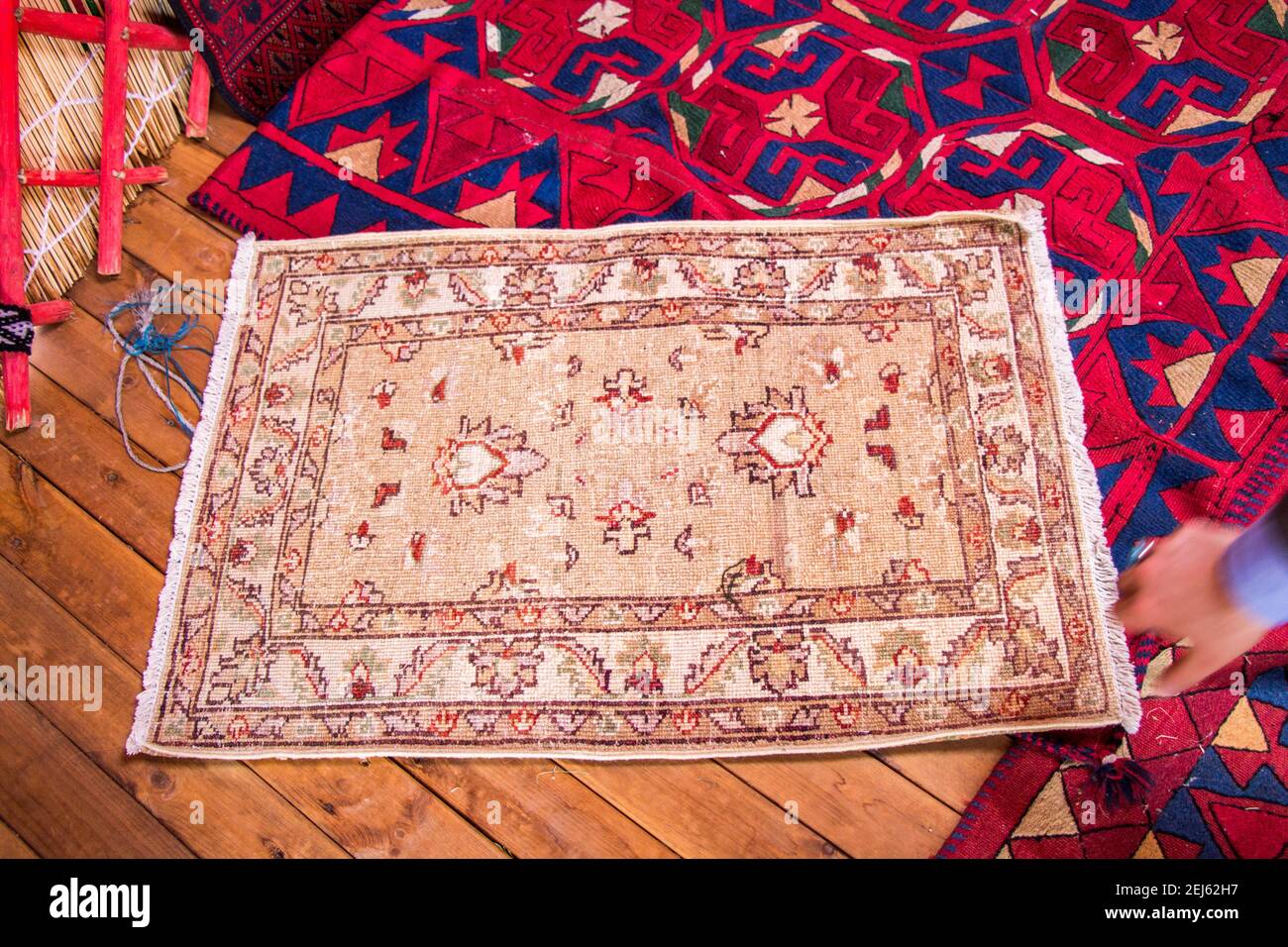 Old hand made carpet and rugs of traditional types Stock Photo Alamy