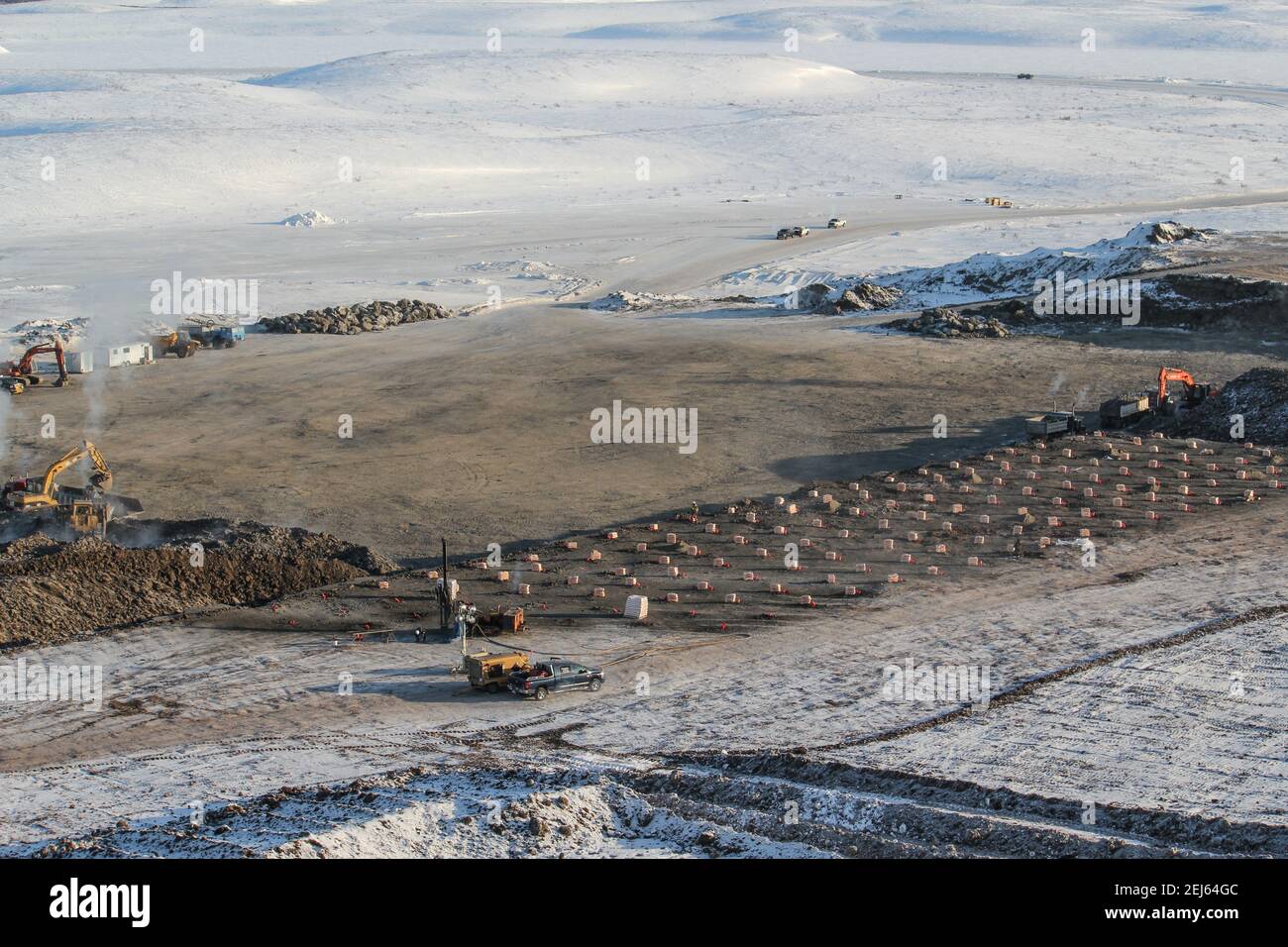 Aerial view of gravel pit and explosives prepared for a blast. Inuvik-Tuktoyaktuk Highway, Northwest Territories, Canada's Arctic. (April 2013) Stock Photo