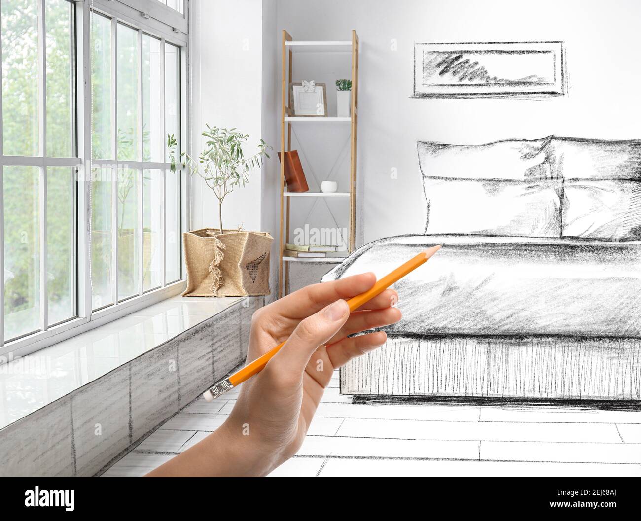 Designer drawing new interior of bedroom Stock Photo - Alamy